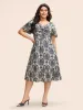 Heart Neckline Bandana Print Twist Front Dress sold by Bloomchic