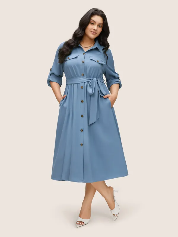 Static-Free Solid Flap Detail Tab Sleeve Dress sold by Bloomchic