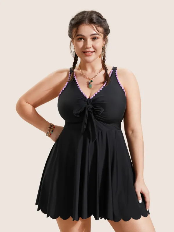 Contrast Embroidered Tie Knot Laser Cut Swim Dress sold by Bloomchic