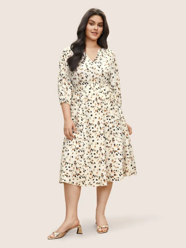 Allover Print Notched Belted Button Detail Dress sold by Bloomchic