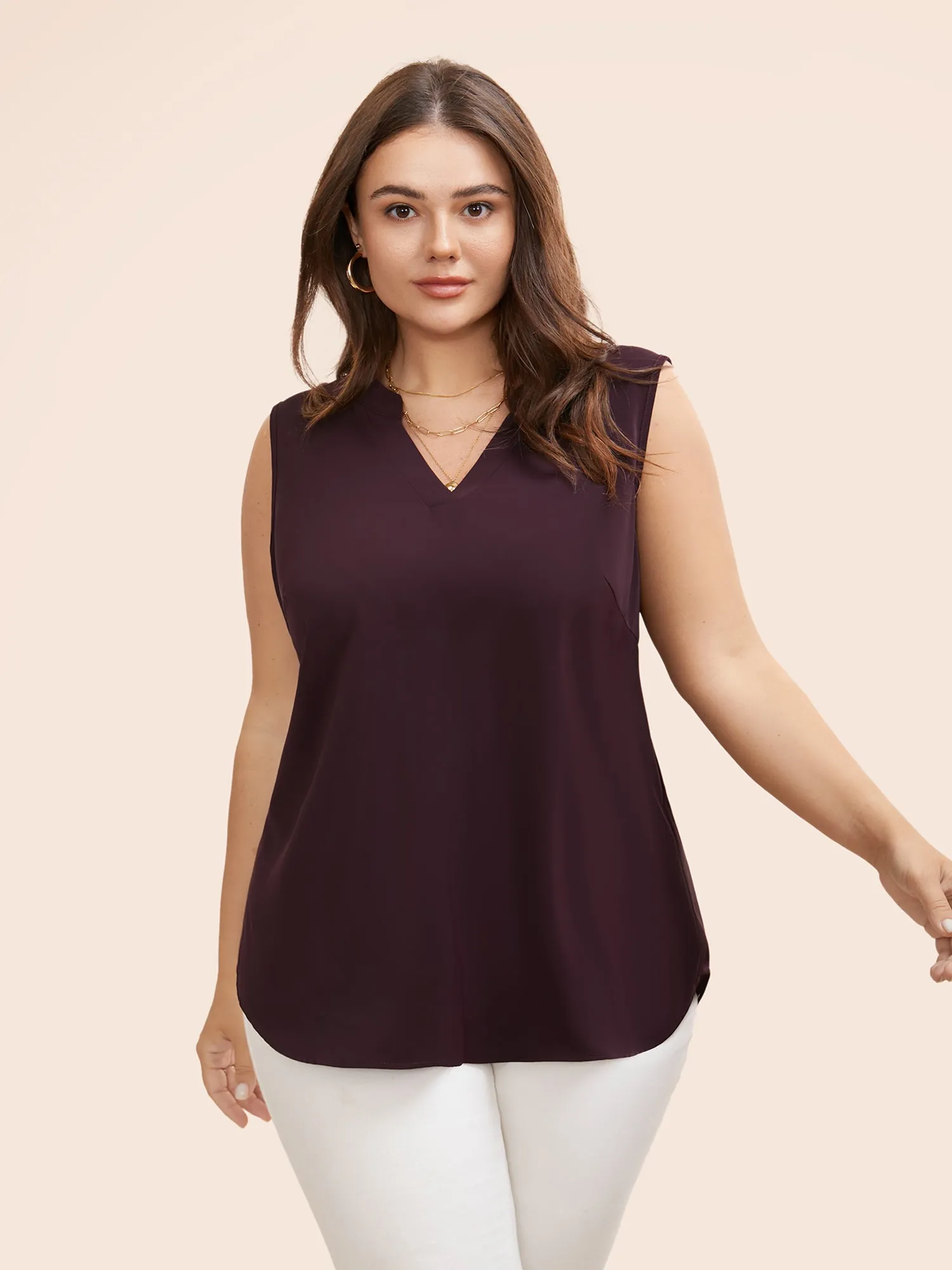 Solid Notched Collar Curved Hem Tank Top sold by Bloomchic
