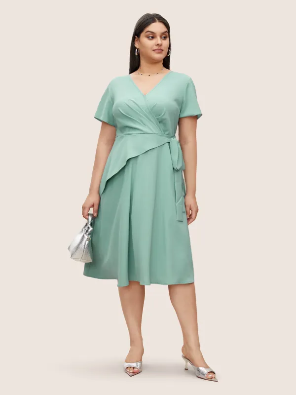 Static-Free Overlap Collar Pleated Tie Knot Dress sold by Bloomchic