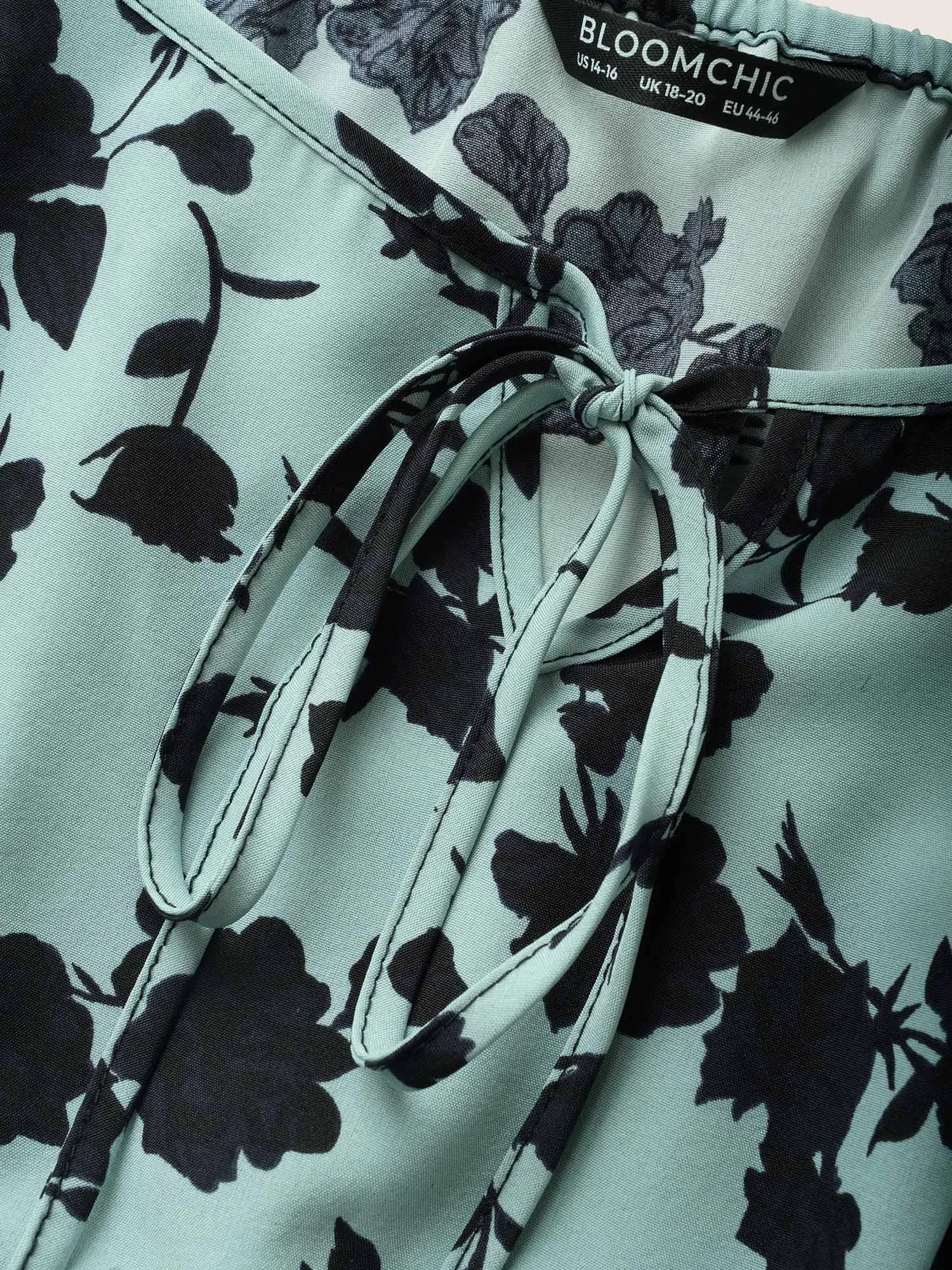 Silhouette Floral Print Knot Neck Flutter Hem Dress sold by Bloomchic product image thumbnail 5