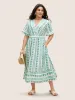 Bandana Striped Overlap Collar Flutter Hem Dress sold by Bloomchic