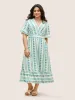 Bandana Striped Overlap Collar Flutter Hem Dress sold by Bloomchic