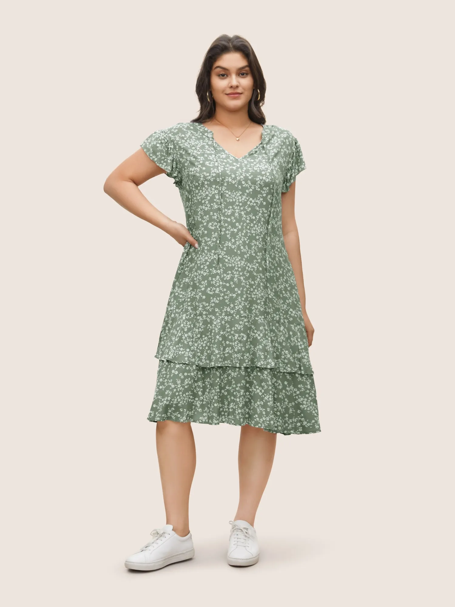 Ditsy Floral Ties Pocket Flutter Layered Hem Dress sold by Bloomchic