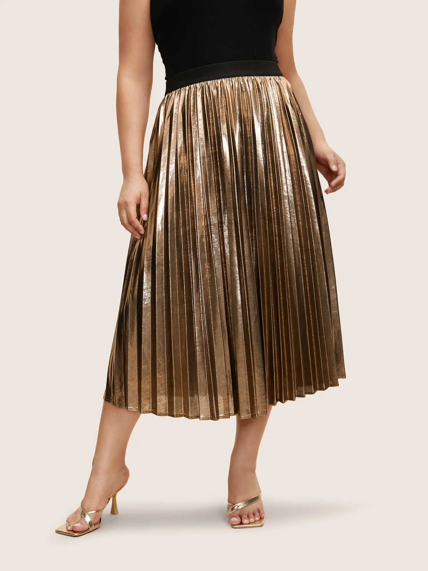 Glitter Metallic Luster Knitted Pleated Skirt sold by Bloomchic