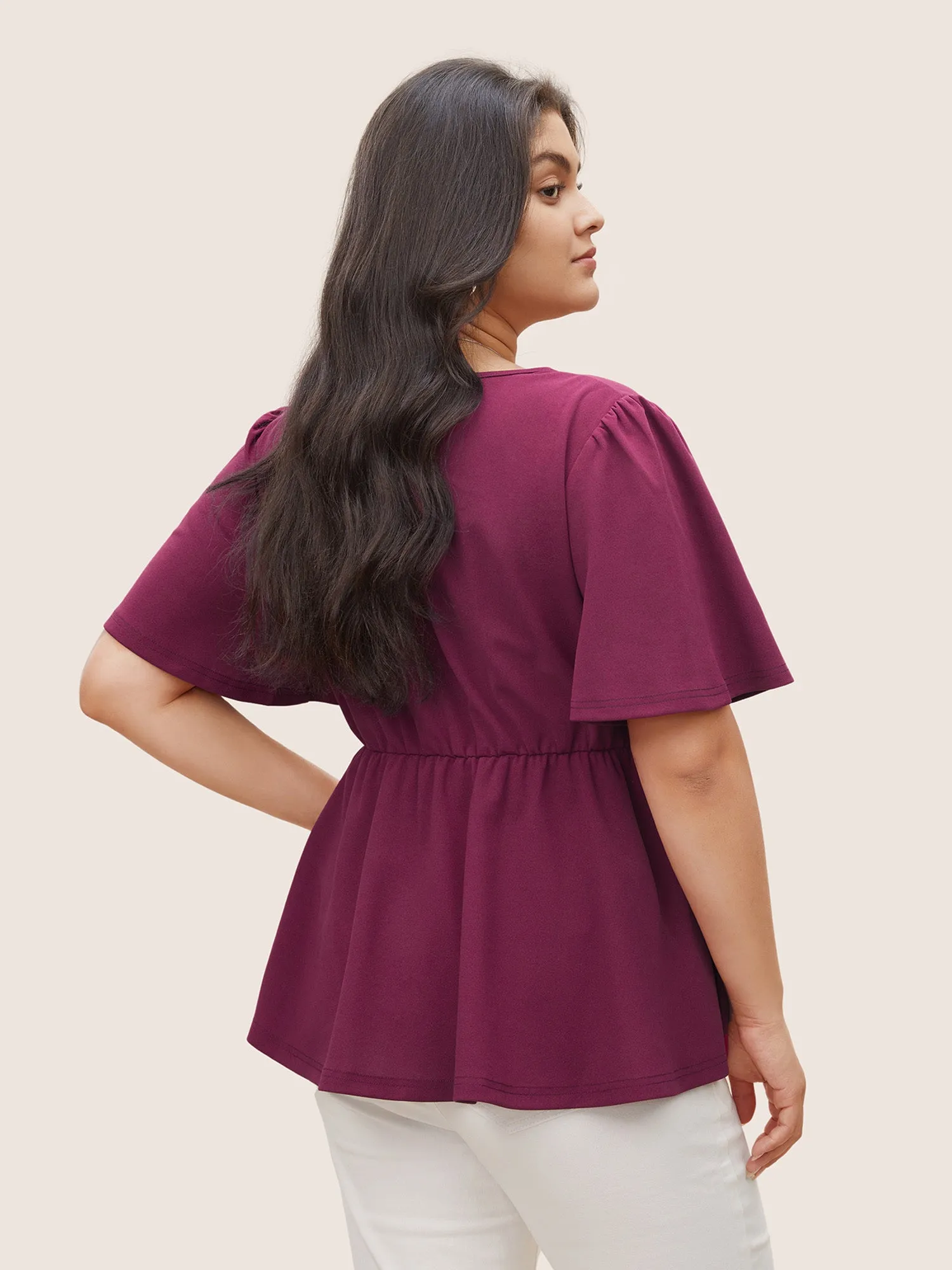 Solid Elastic Waist Flutter Sleeve Buckle Detail Blouse sold by Bloomchic product image thumbnail 4