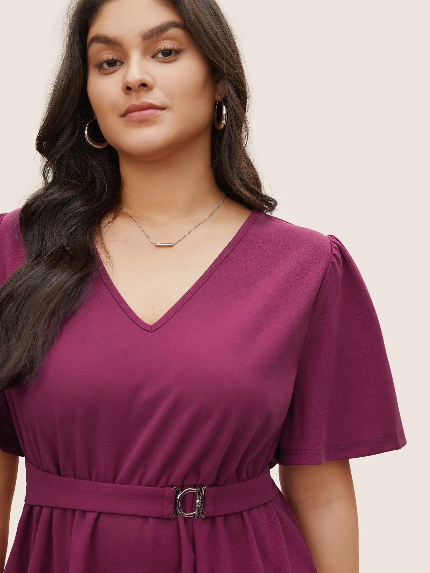 Solid Elastic Waist Flutter Sleeve Buckle Detail Blouse sold by Bloomchic product image thumbnail 3