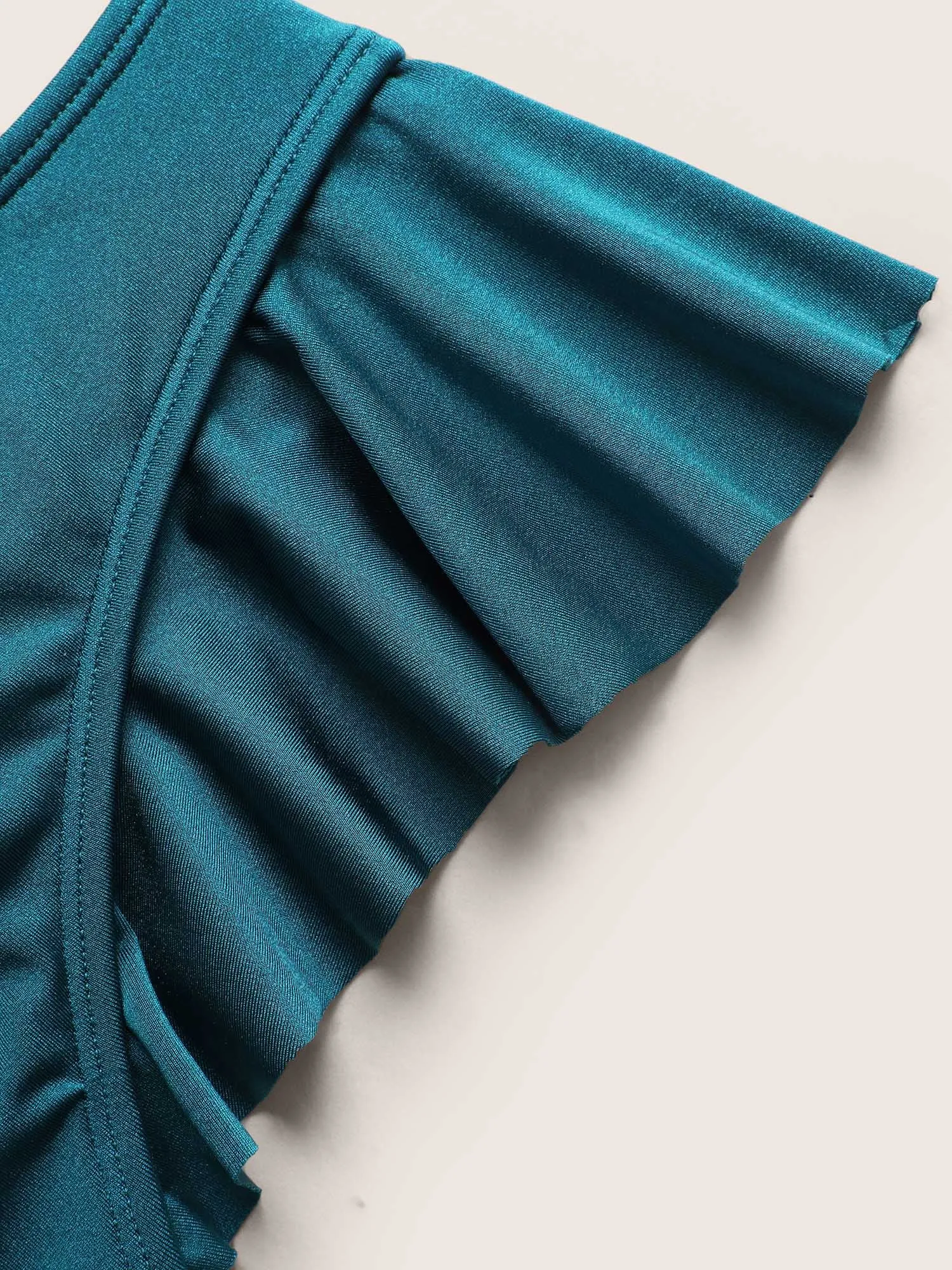 Solid Wrap Ruffle Cap Sleeve Swim Top sold by Bloomchic product image thumbnail 5