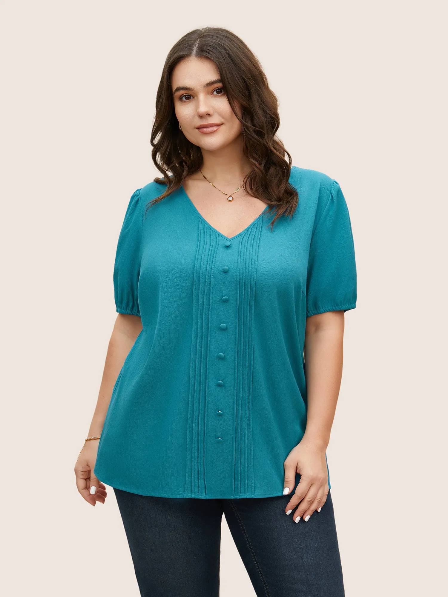 V Neck Button Detail Pleated Split Hem Blouse sold by Bloomchic