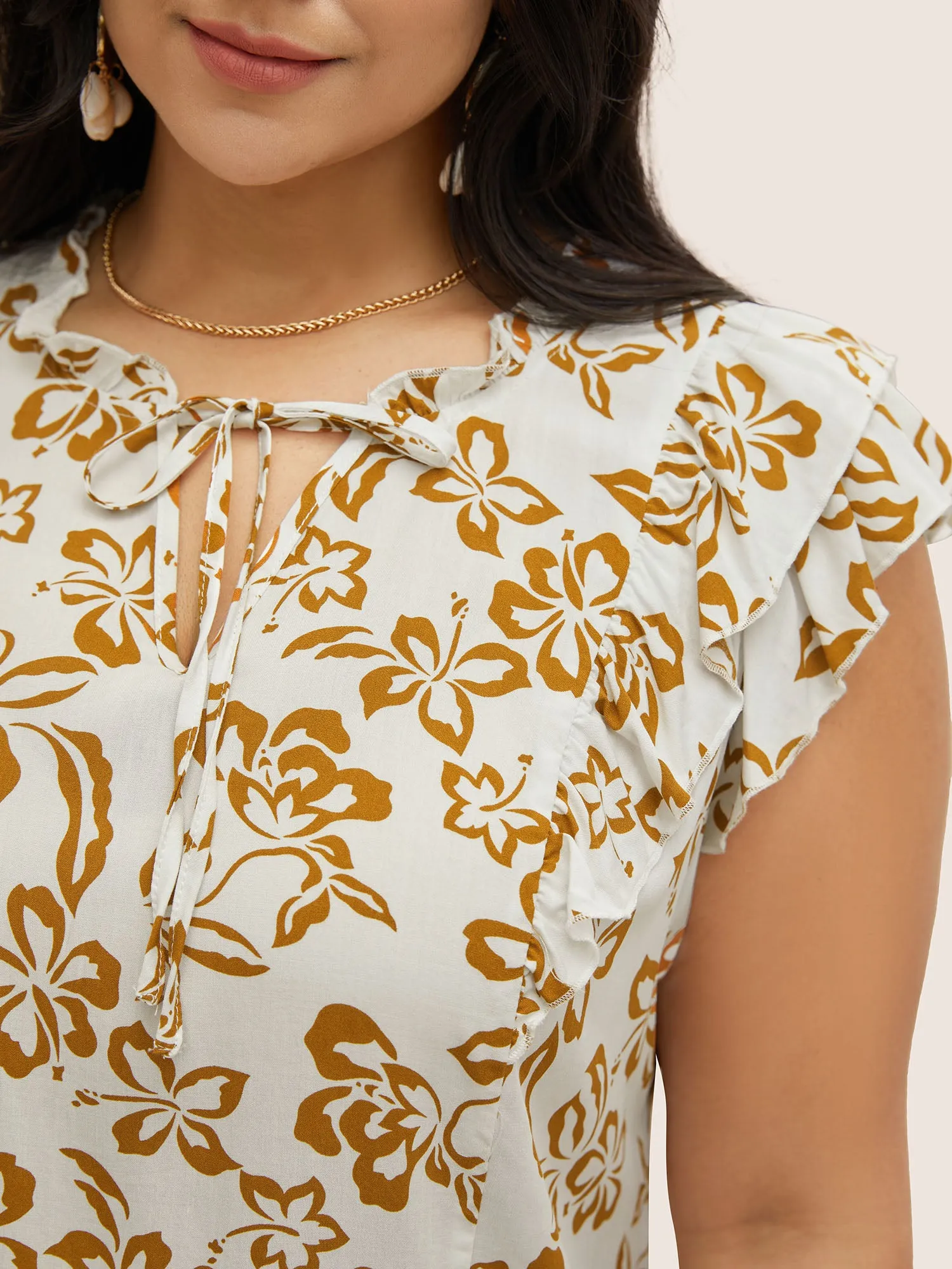 Silhouette Floral Print Tiered Ruffle Cap Sleeve Blouse sold by Bloomchic product image thumbnail 3