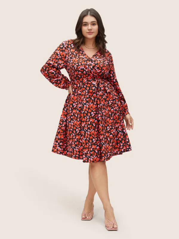 Heart Allover Print Belted Surplice Neck Dress sold by Bloomchic