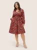 Heart Allover Print Belted Surplice Neck Dress sold by Bloomchic