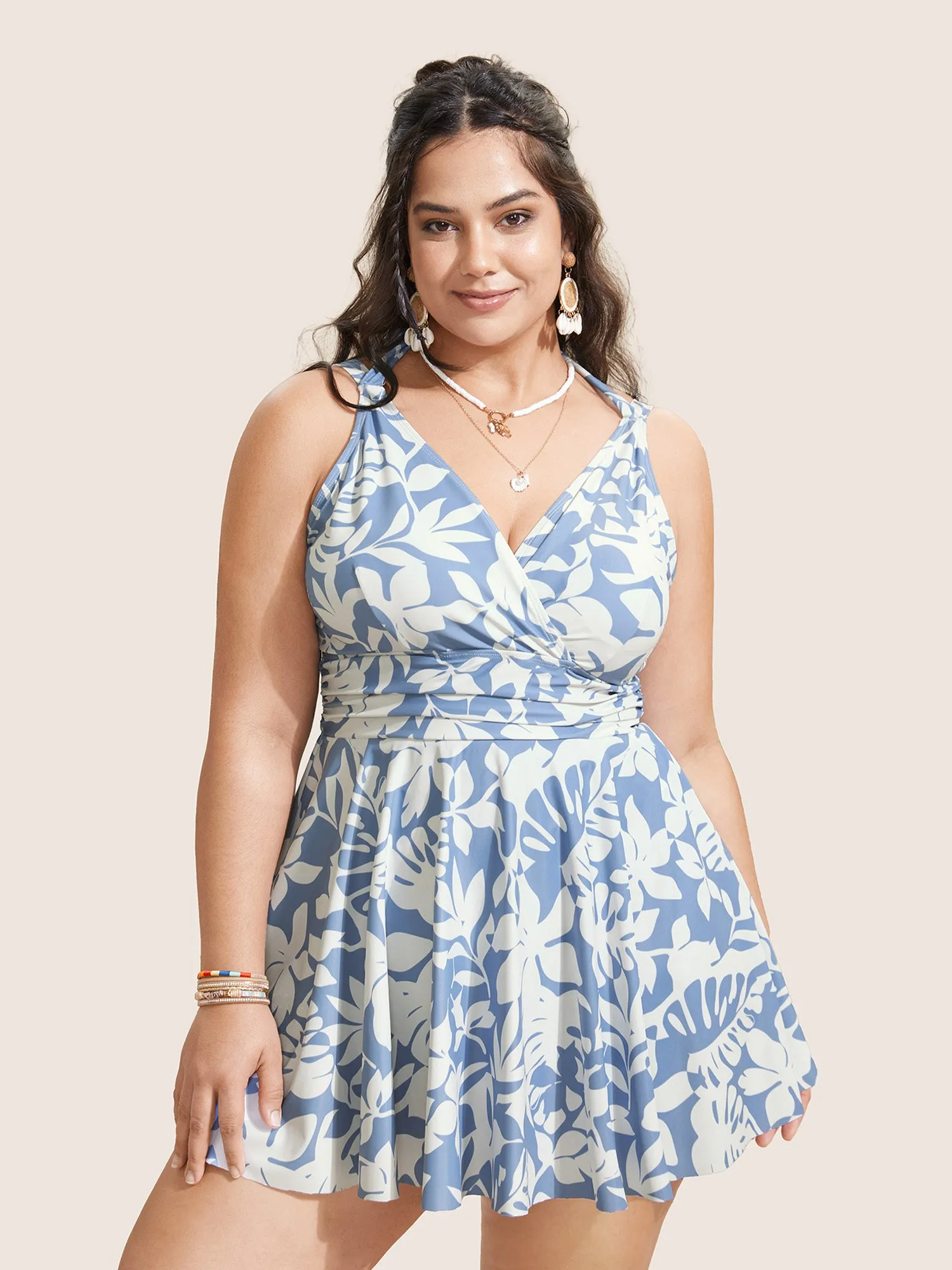 Overlap Collar Silhouette Floral Print Swim Dress sold by Bloomchic