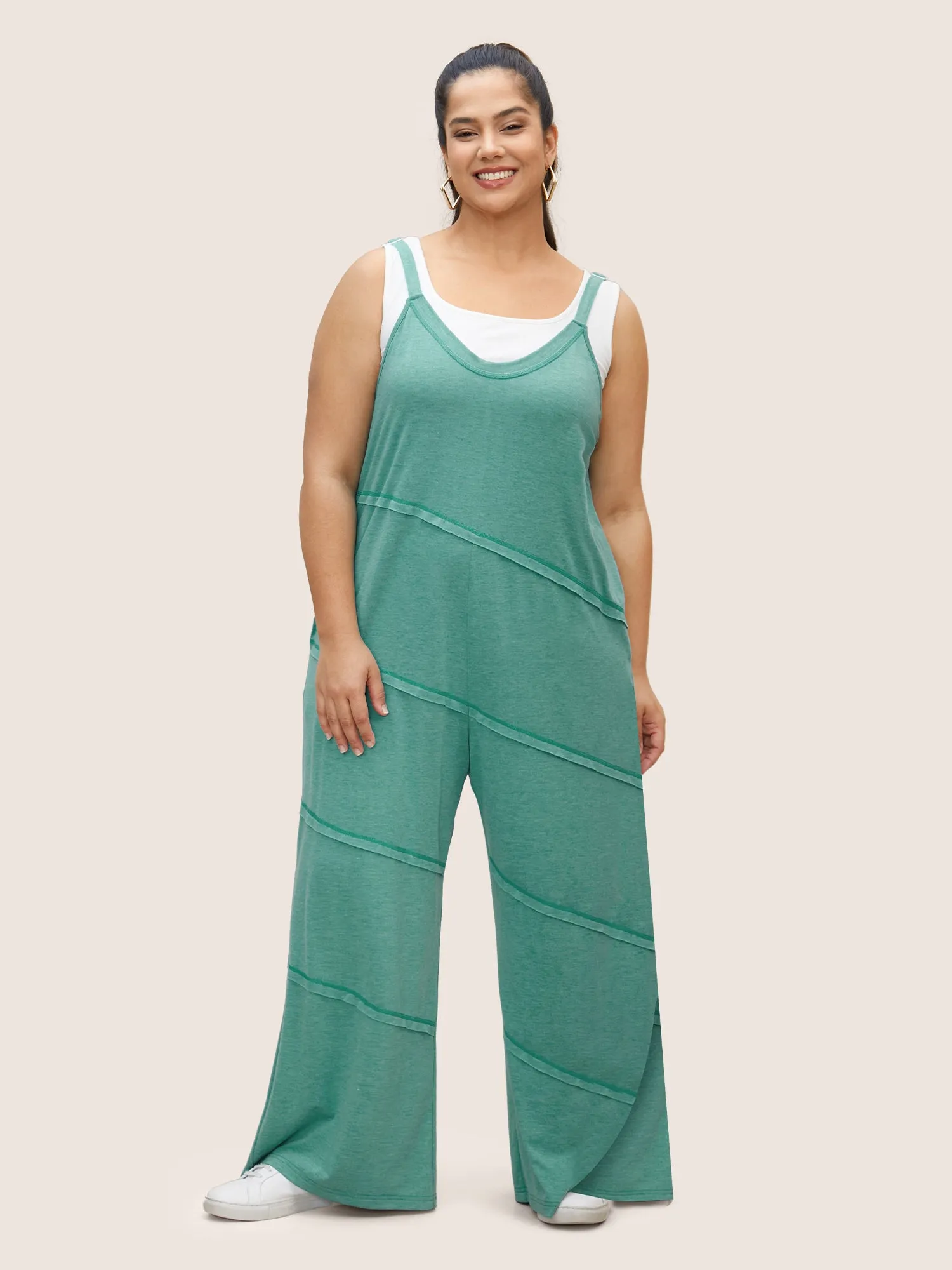 Solid V Neck Asymmetrical Patchwork Jumpsuit sold by Bloomchic