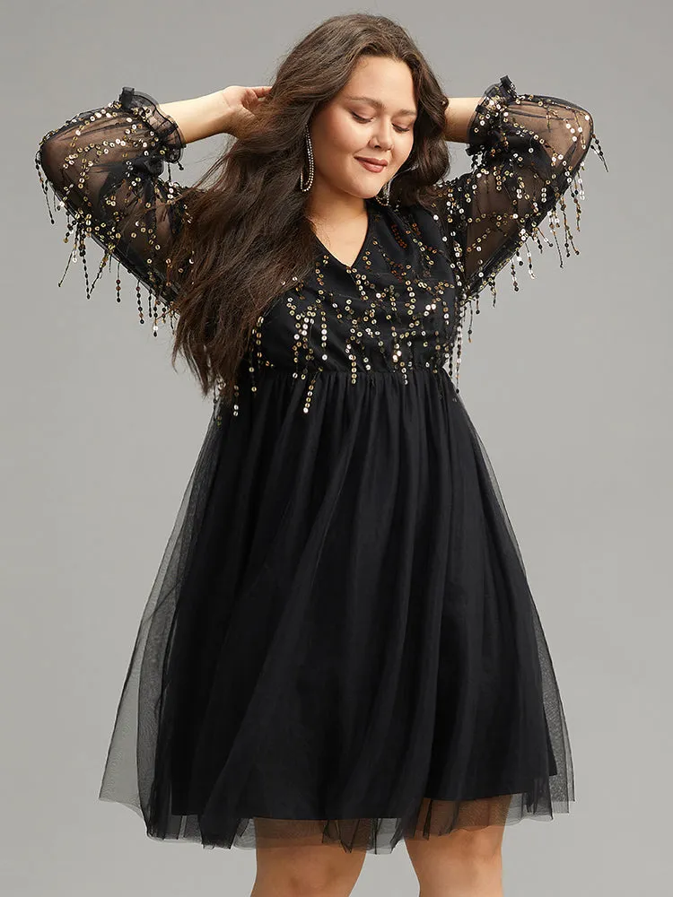 Sequin Mesh Patchwork Tassel Dress sold by Bloomchic