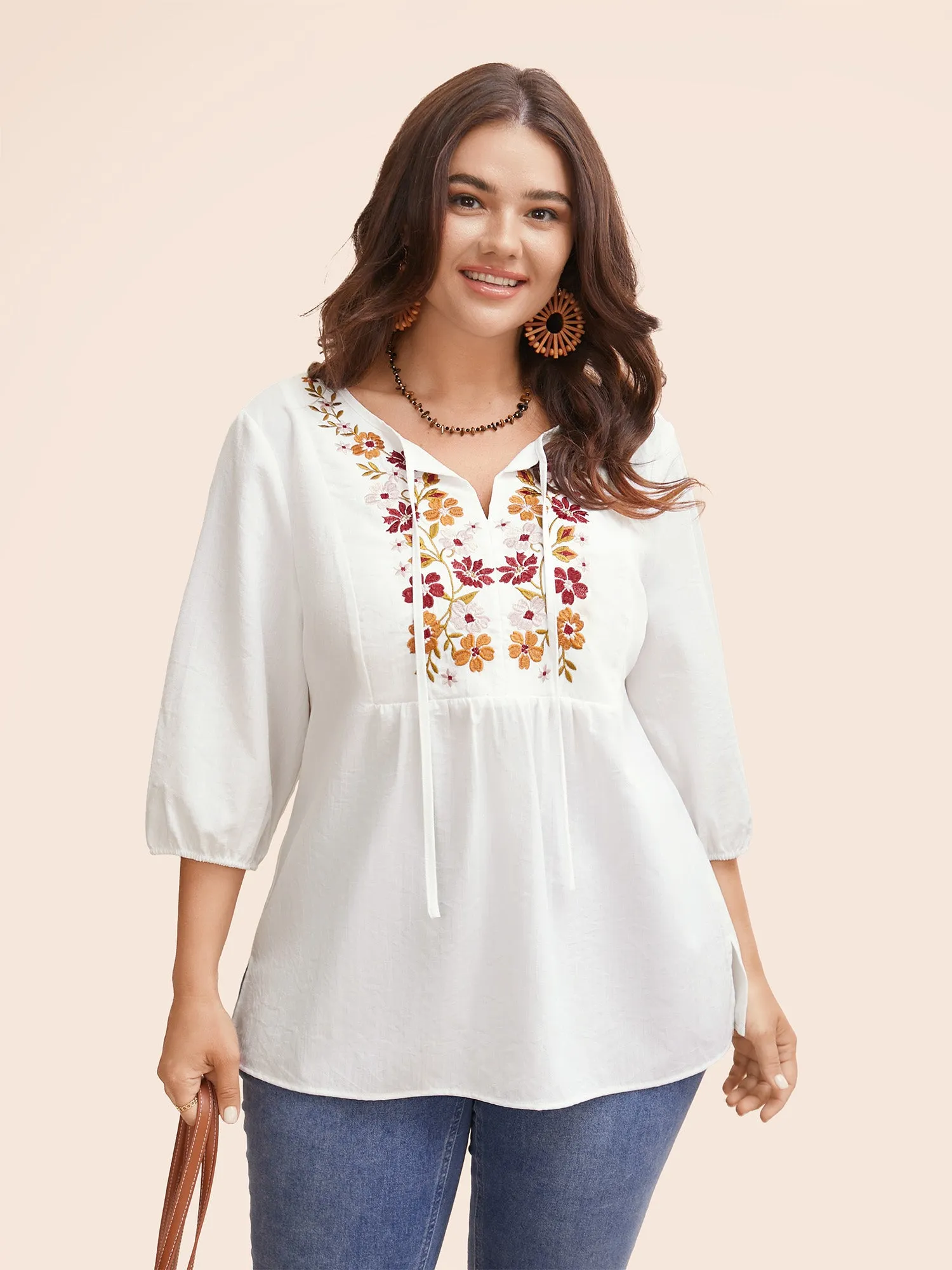 Floral Embroidered Tie Knot Lantern Sleeve Blouse sold by Bloomchic