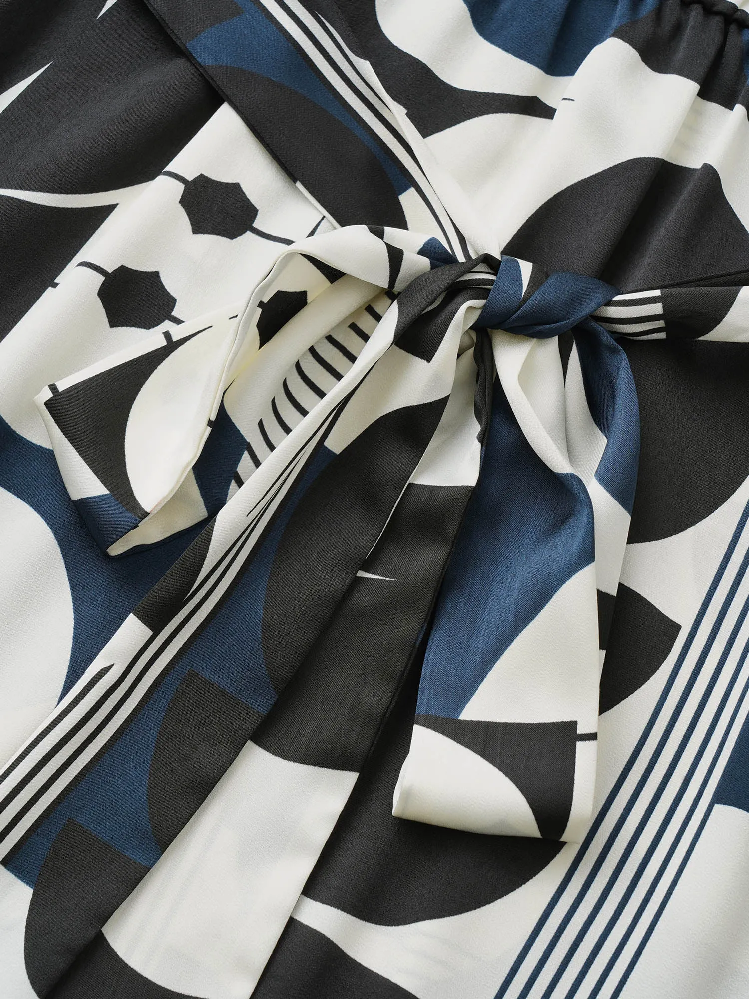 Geometric Belted Notched Button Up Dress sold by Bloomchic product image thumbnail 5