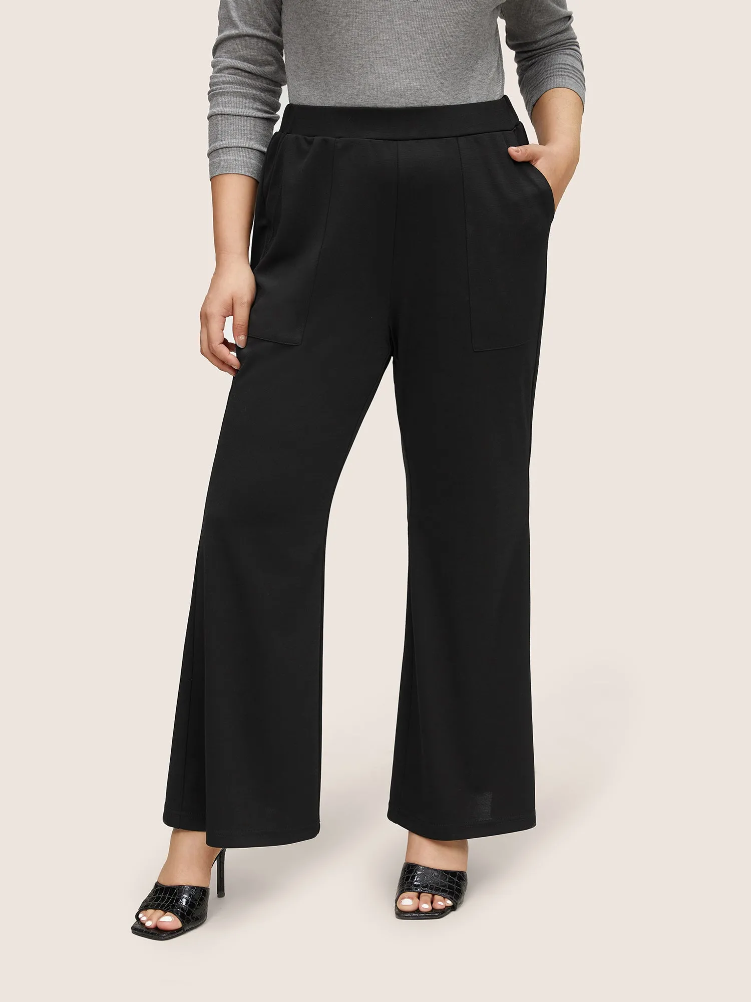Solid Elastic Waist Pocket Flare Leg Pants sold by Bloomchic
