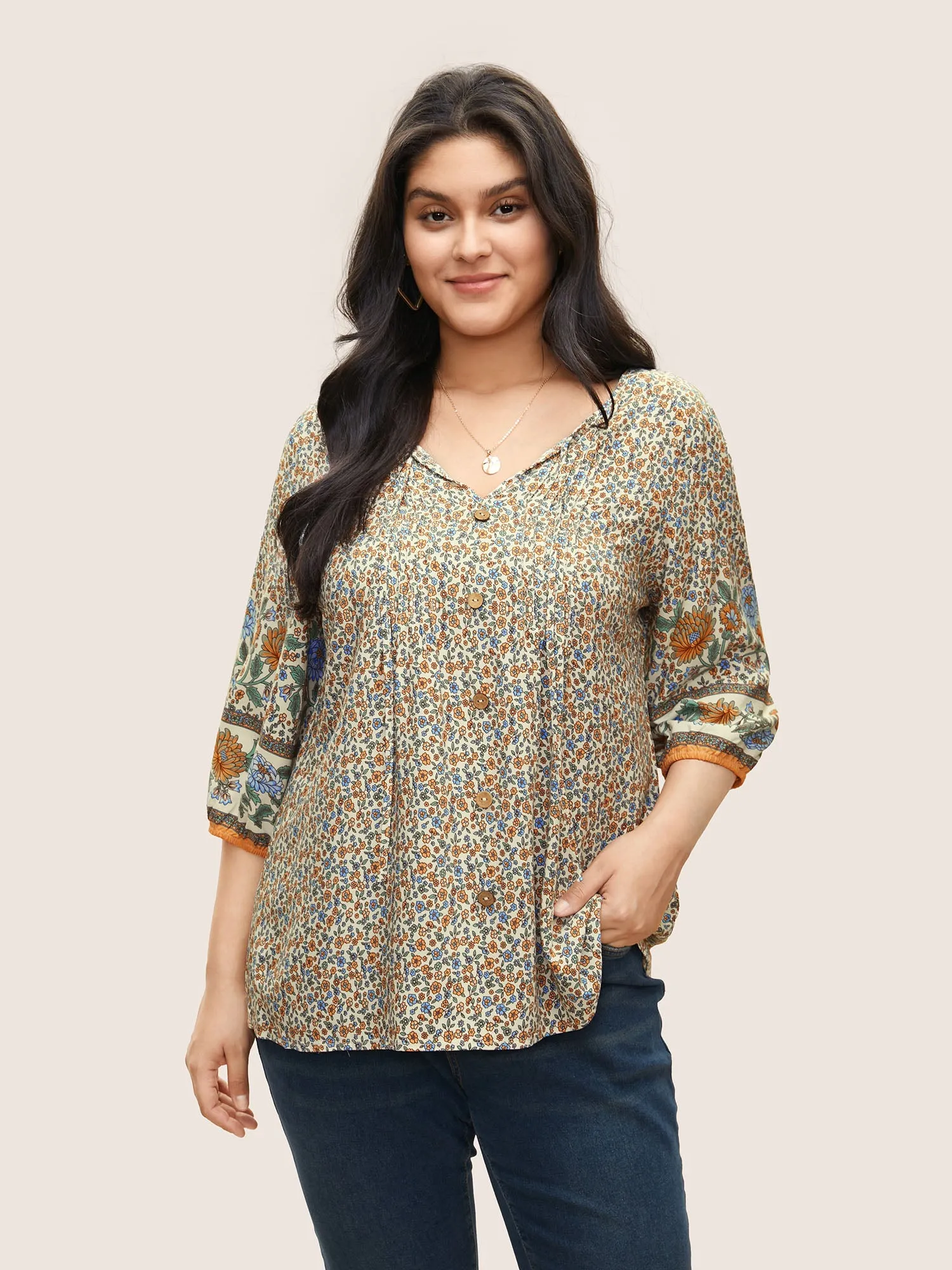 Boho Print Pleated Button Detail Tie Neck Blouse sold by Bloomchic