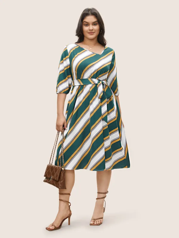 Striped Contrast Asymmetrical Neck Belted Dress sold by Bloomchic