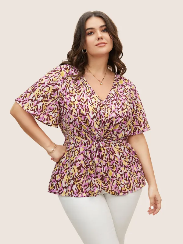 Leopard Print Twist Front Flutter Sleeve Blouse made by Bloomchic