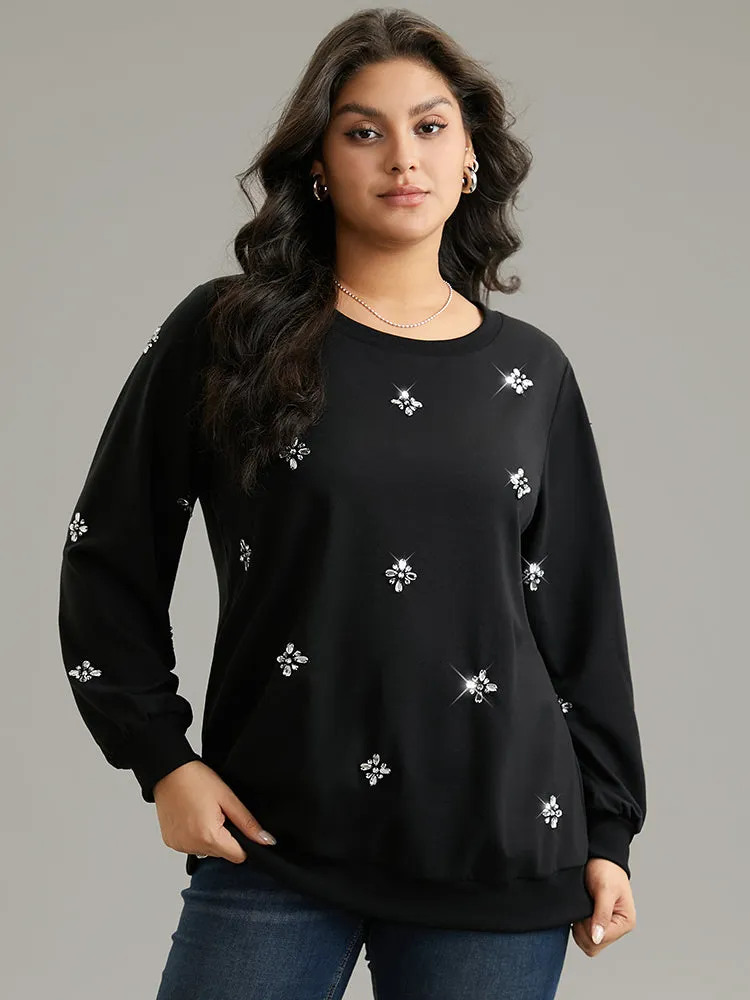 Beaded Floral Elastic Cuffs Sweatshirt sold by Bloomchic