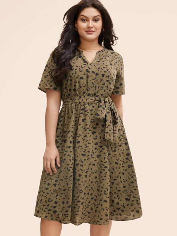 Leopard Print Notched Pocket Belted Dress sold by Bloomchic
