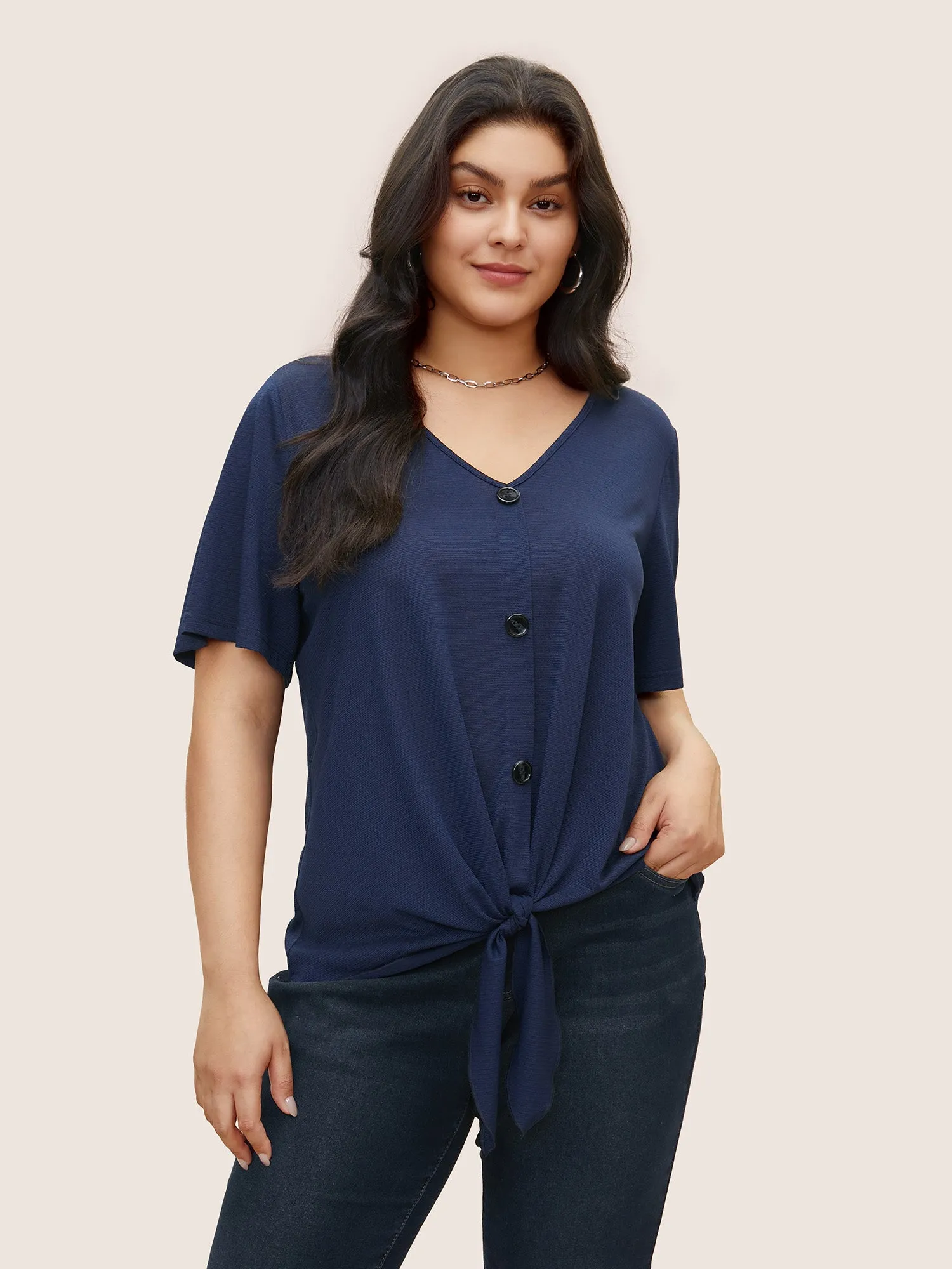 Plain Twist Front Button Detail T-shirt sold by Bloomchic