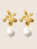 Flower Shaped Faux Pearl Stud Earrings sold by Bloomchic