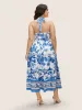 Boho Print Halter Neck Shirred Tie Knot Dress sold by Bloomchic