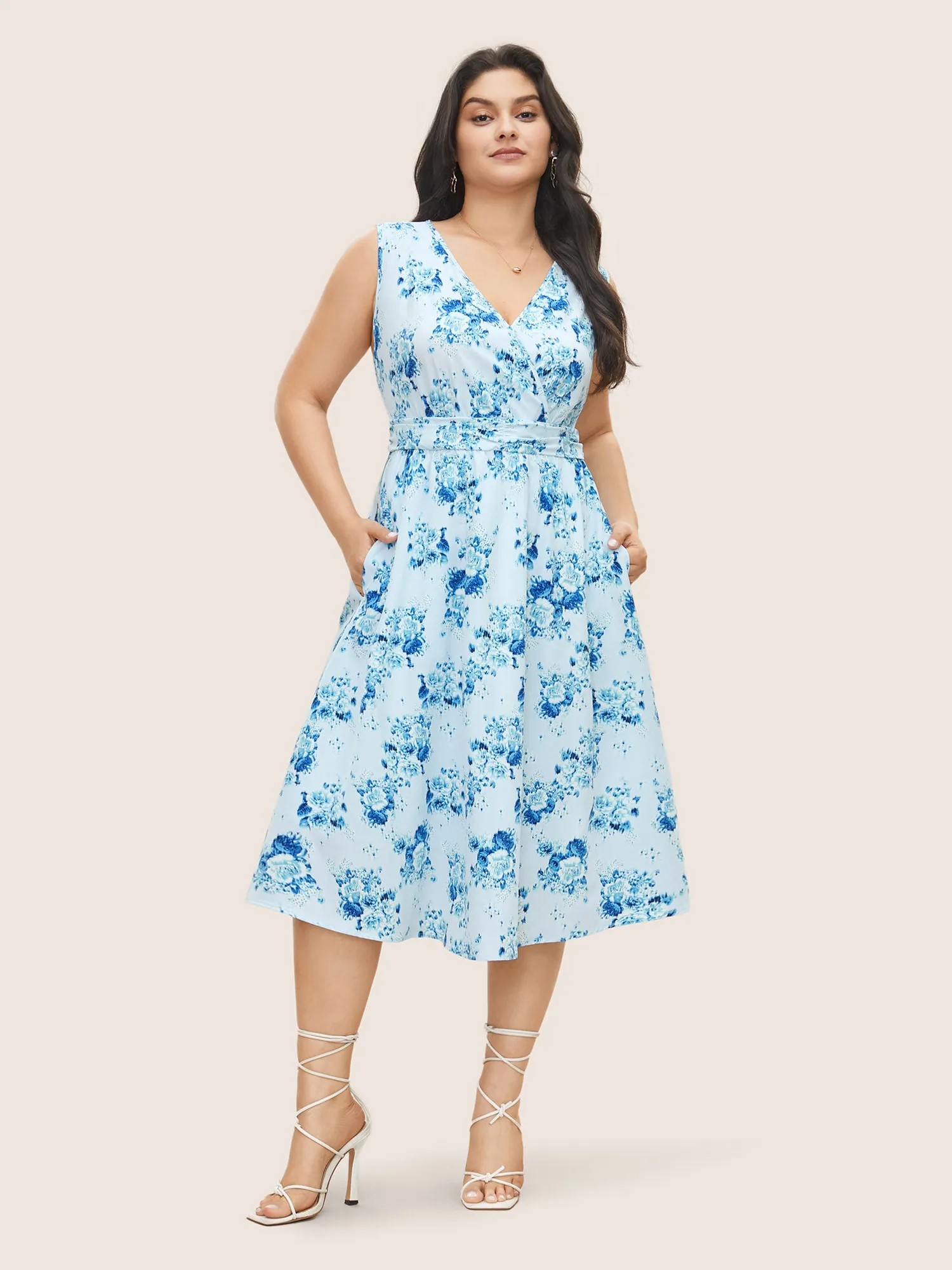 Overlap Collar Floral Sleeveless Ruched Dress sold by Bloomchic