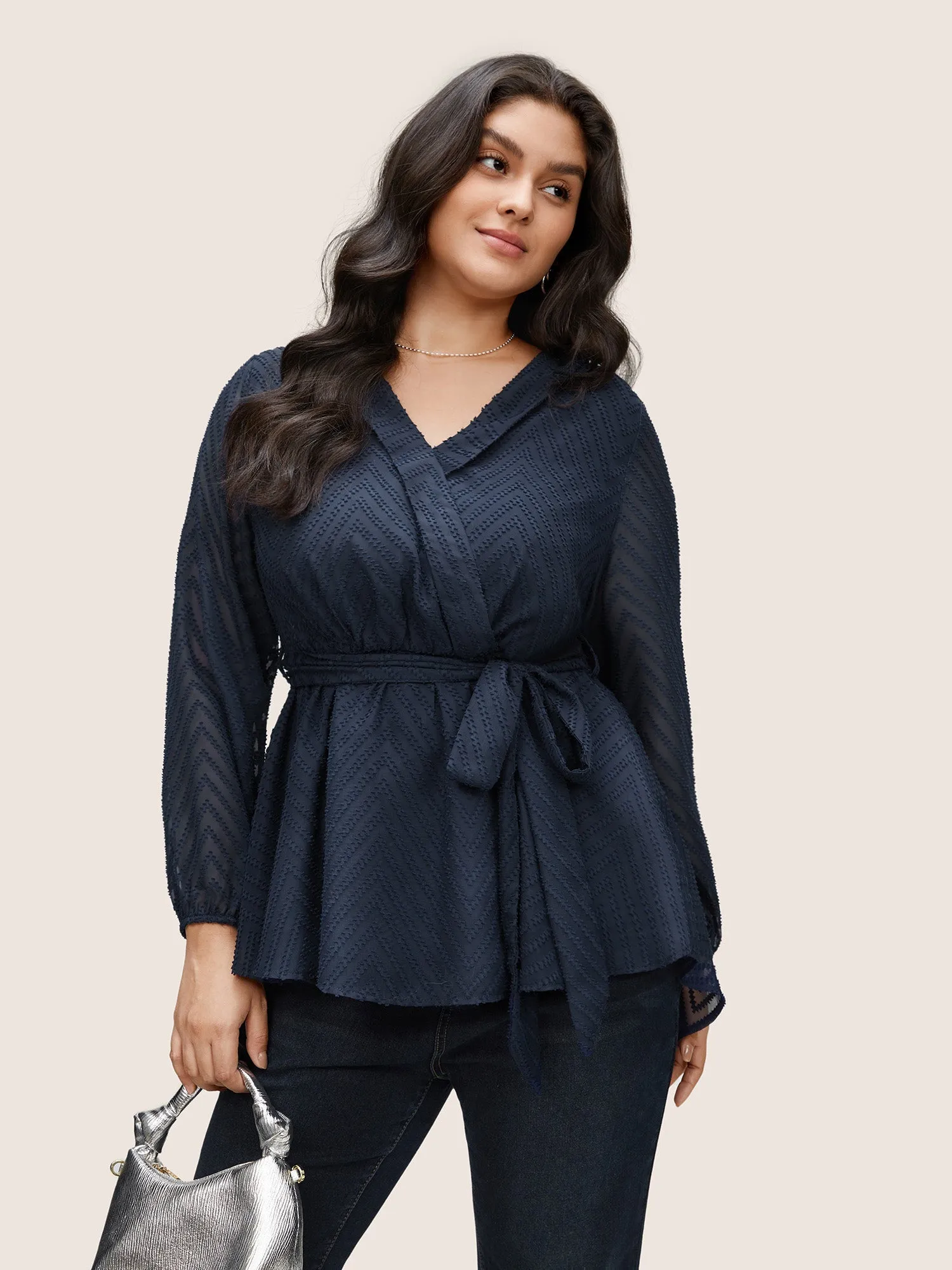 Plain Textured High Low Hem Ties Blouse sold by Bloomchic