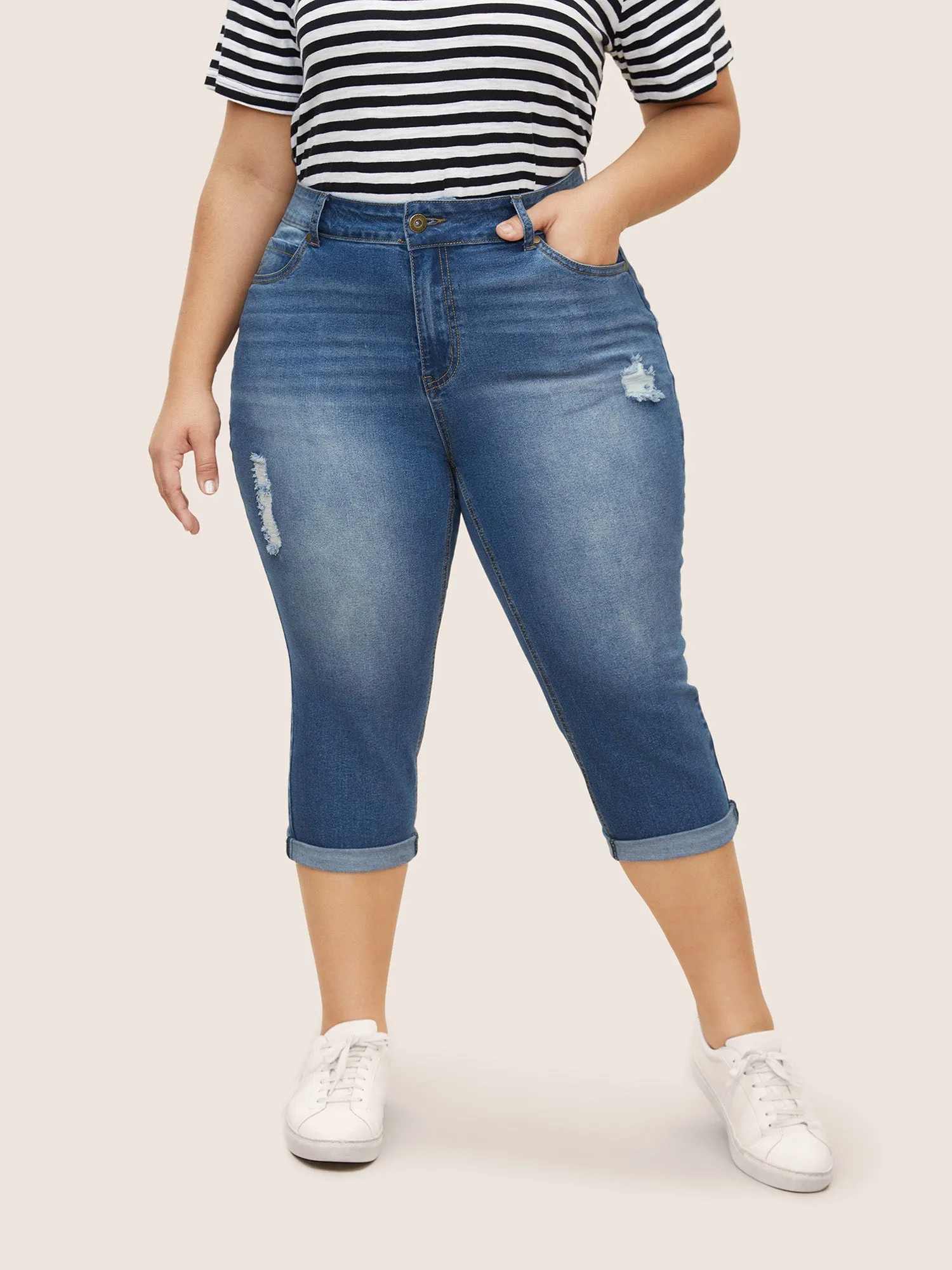 Light Wash Distressed Roll Hem Jeans sold by Bloomchic