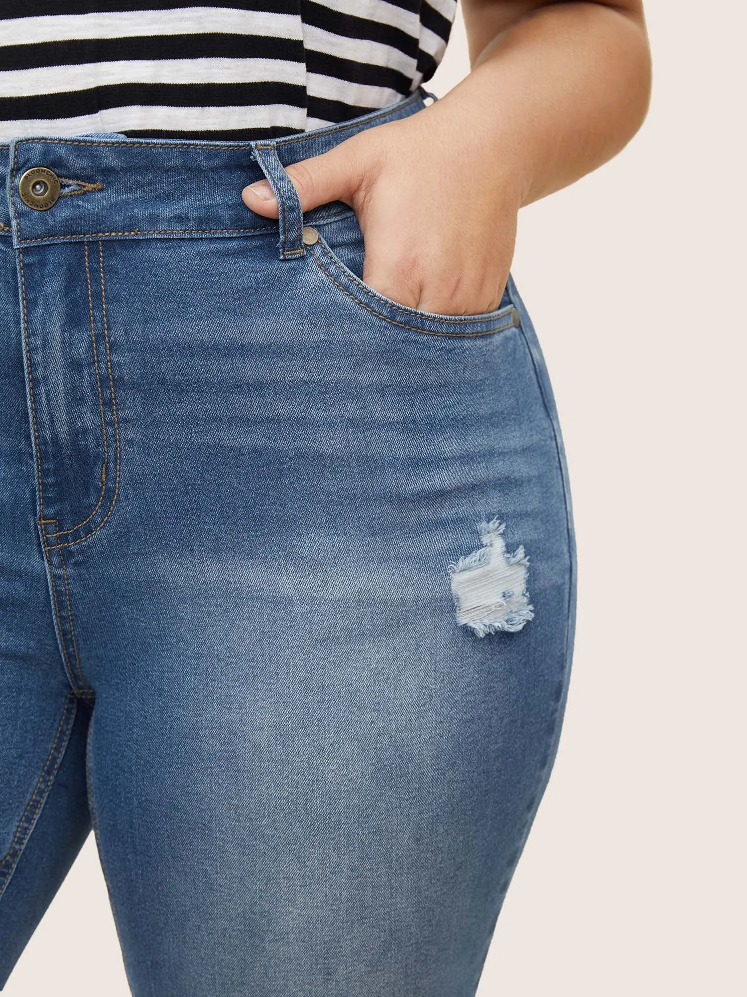 Light Wash Distressed Roll Hem Jeans sold by Bloomchic product image thumbnail 5