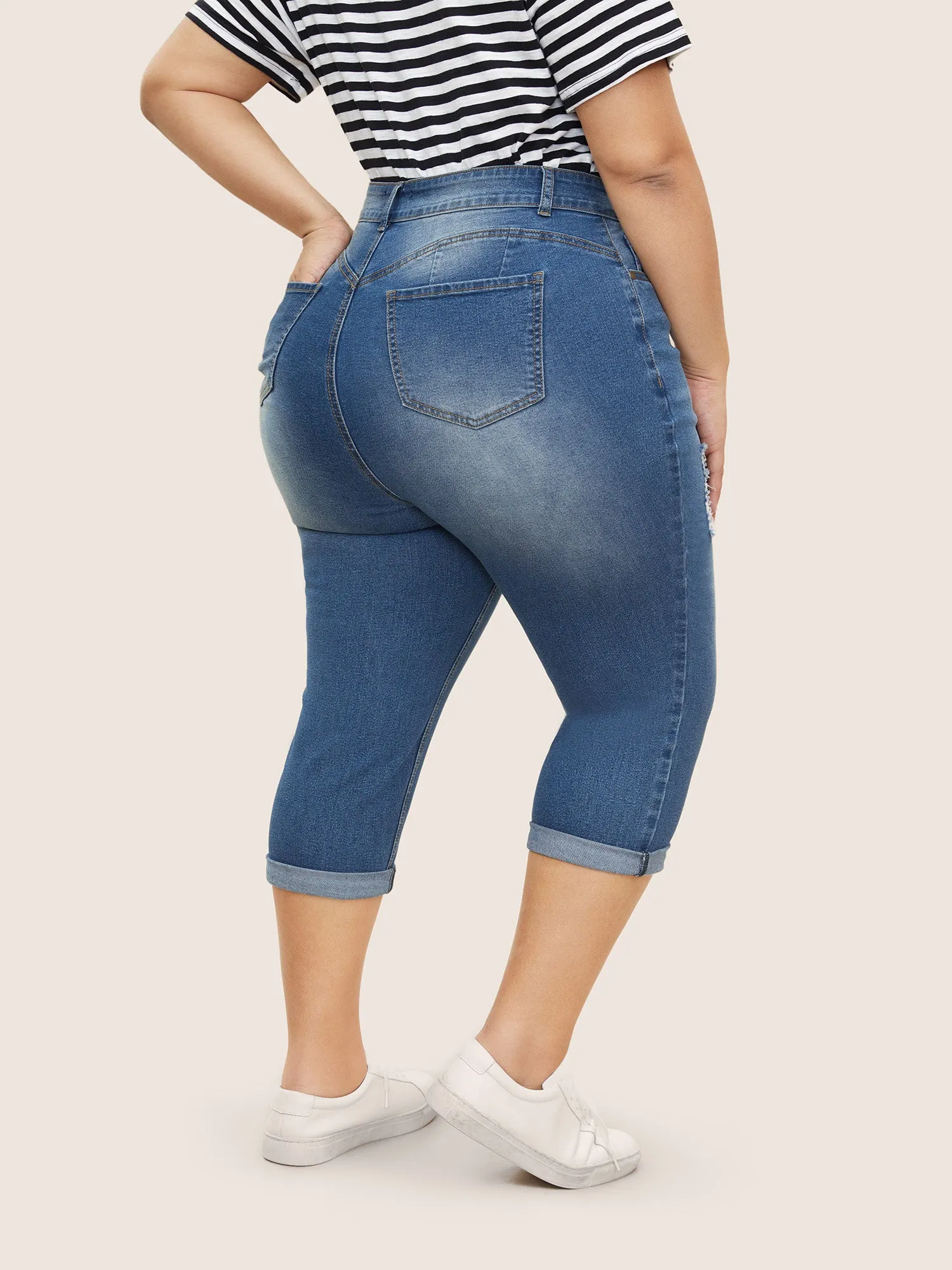 Light Wash Distressed Roll Hem Jeans sold by Bloomchic product image thumbnail 4