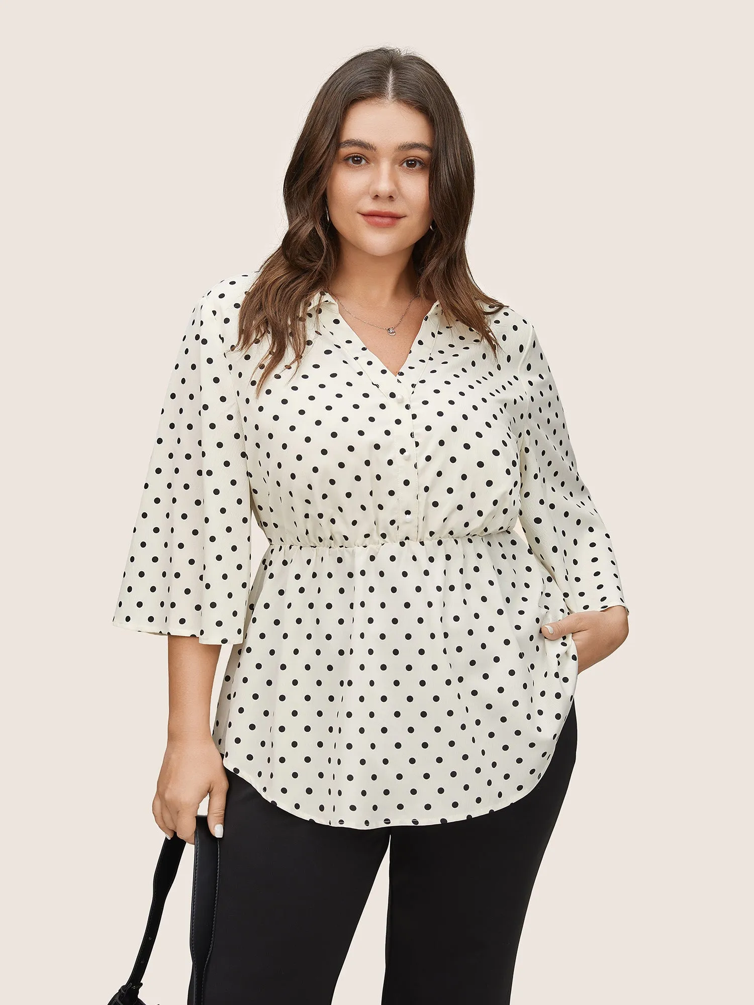 Polka Dot Button Detail Arc Hem Blouse sold by Bloomchic