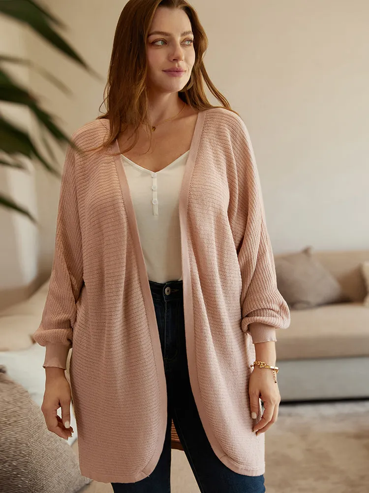 Plain Textured Curved Hem Cardigan sold by Bloomchic