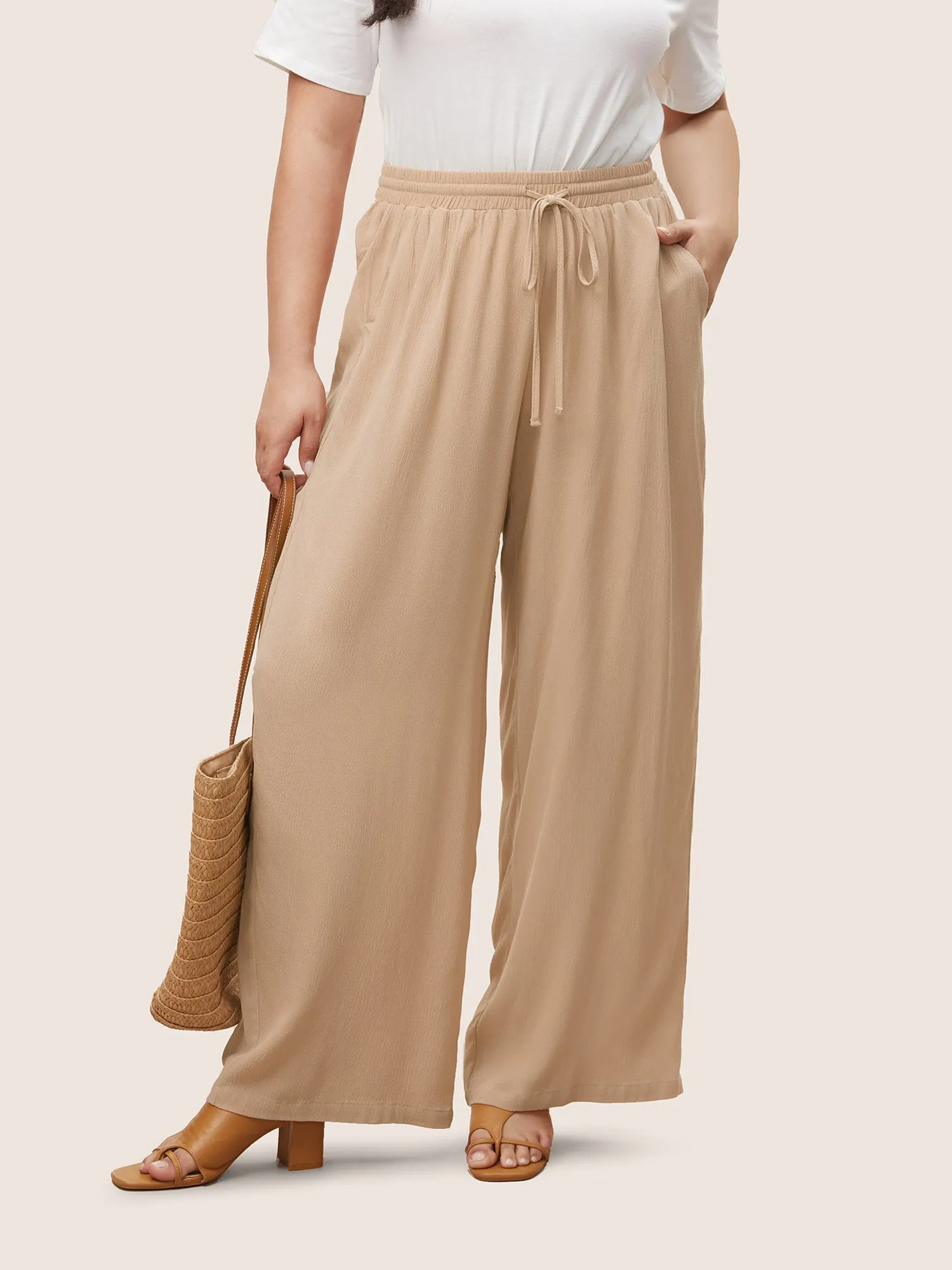 Solid Texture Drawstring Rayon Wide Leg Pants sold by Bloomchic