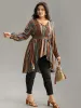 Striped Overlap Collar Arc Hem Belted Blouse sold by Bloomchic