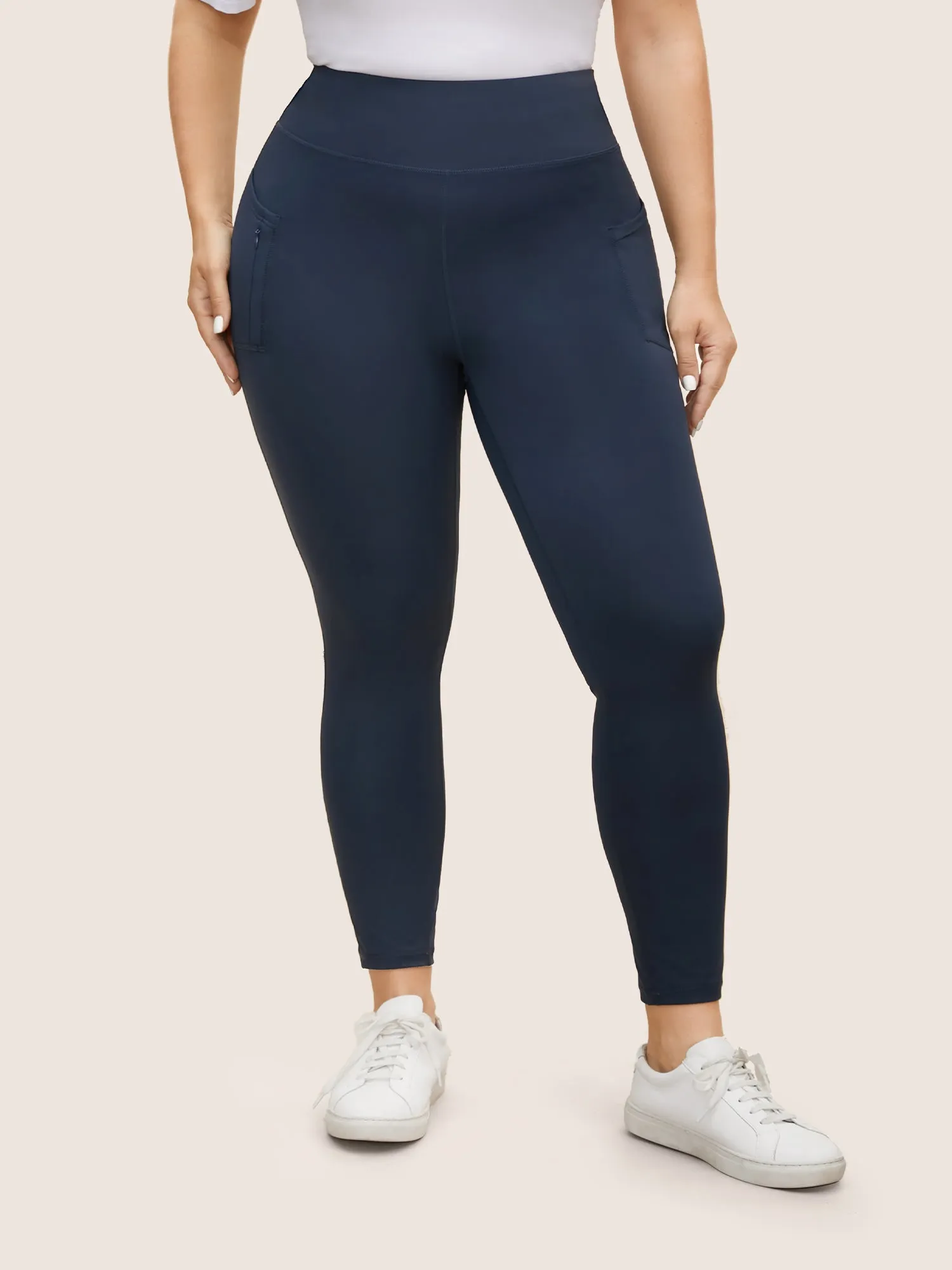 Mid Rise Patch Pocket Zipper Skinny Leggings sold by Bloomchic