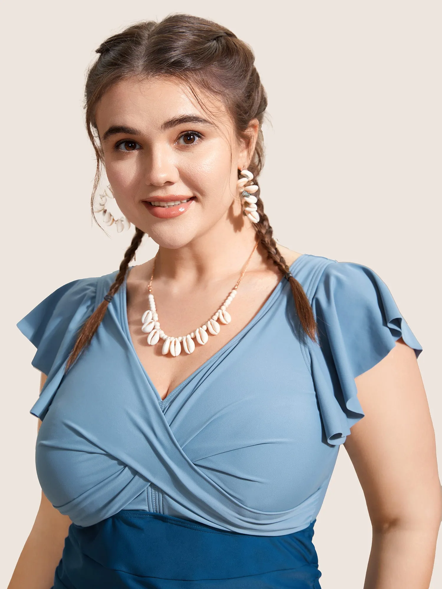 Two Tone Gathered Ruffle Sleeve One Piece Swimsuit sold by Bloomchic product image thumbnail 4