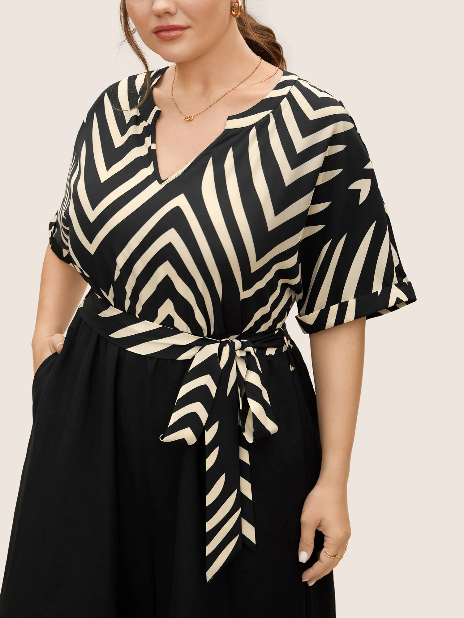 Striped Patchwork Knot Cuffed Sleeve Jumpsuit sold by Bloomchic product image thumbnail 2