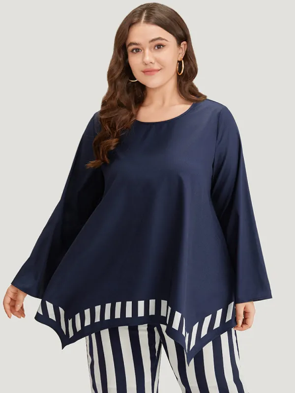Geo Contrast Asymmetrical Hem Woven Top sold by Bloomchic