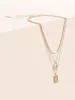 Lock & Heart Charm Chain Necklace sold by Bloomchic