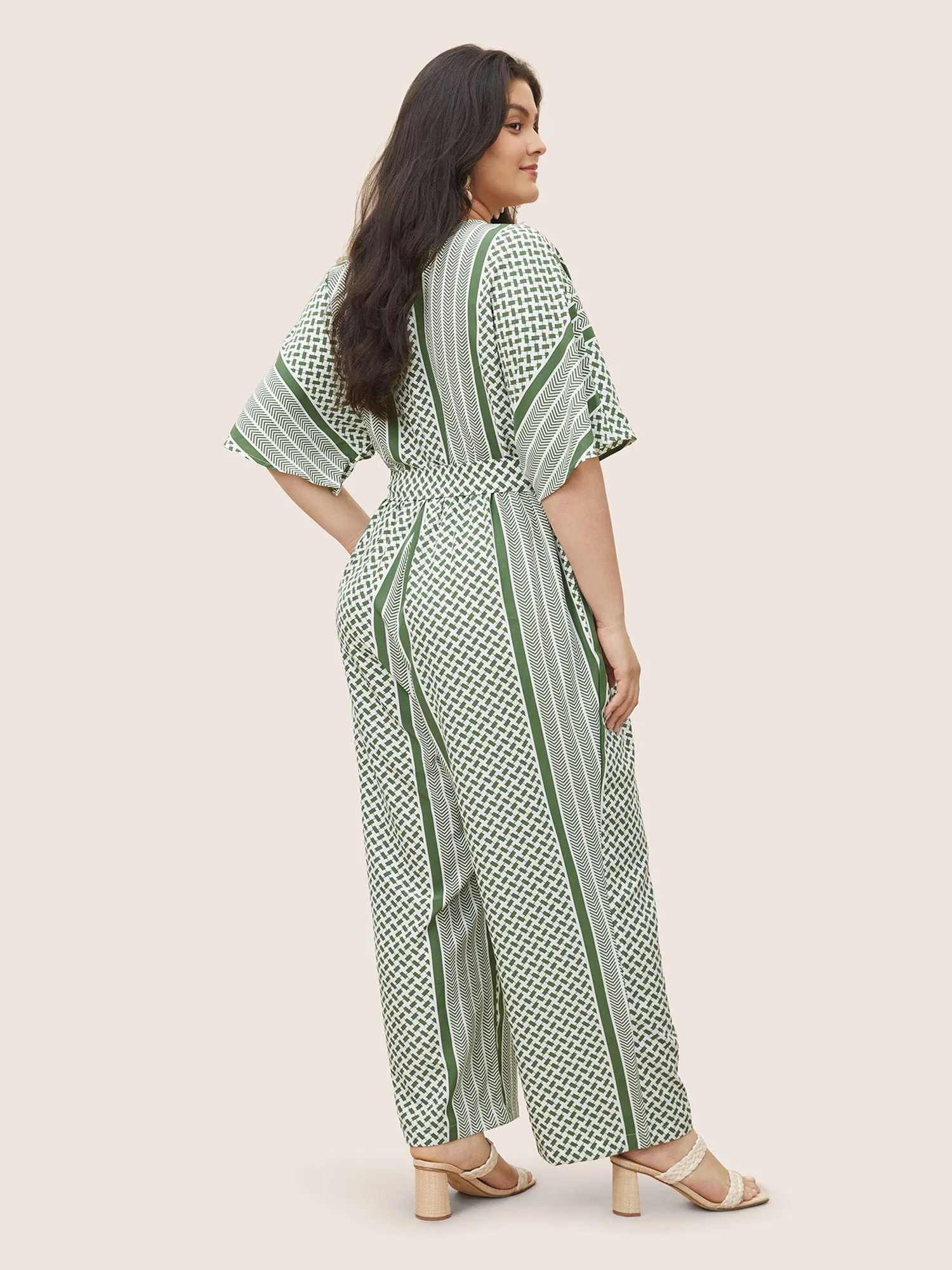 Geometric Contrast Dolman Sleeve Pocket Belted Wrap Jumpsuit sold by Bloomchic product image thumbnail 3