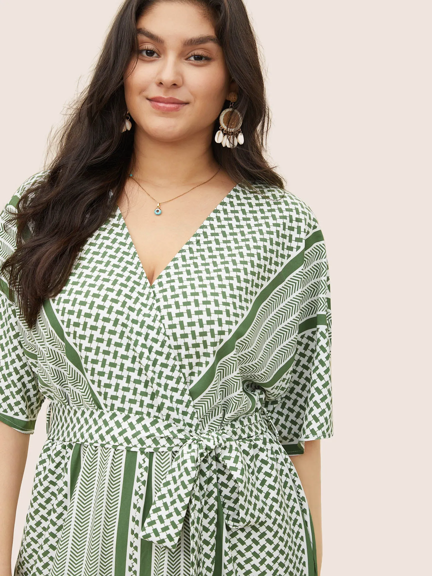 Geometric Contrast Dolman Sleeve Pocket Belted Wrap Jumpsuit sold by Bloomchic product image thumbnail 4