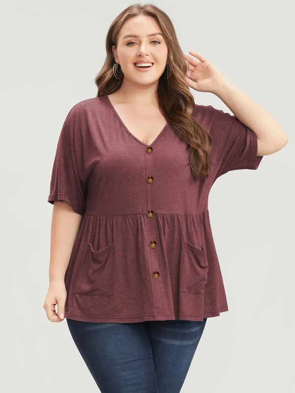 Solid Button Detail Pocket Ruffles Hem T-shirt sold by Bloomchic