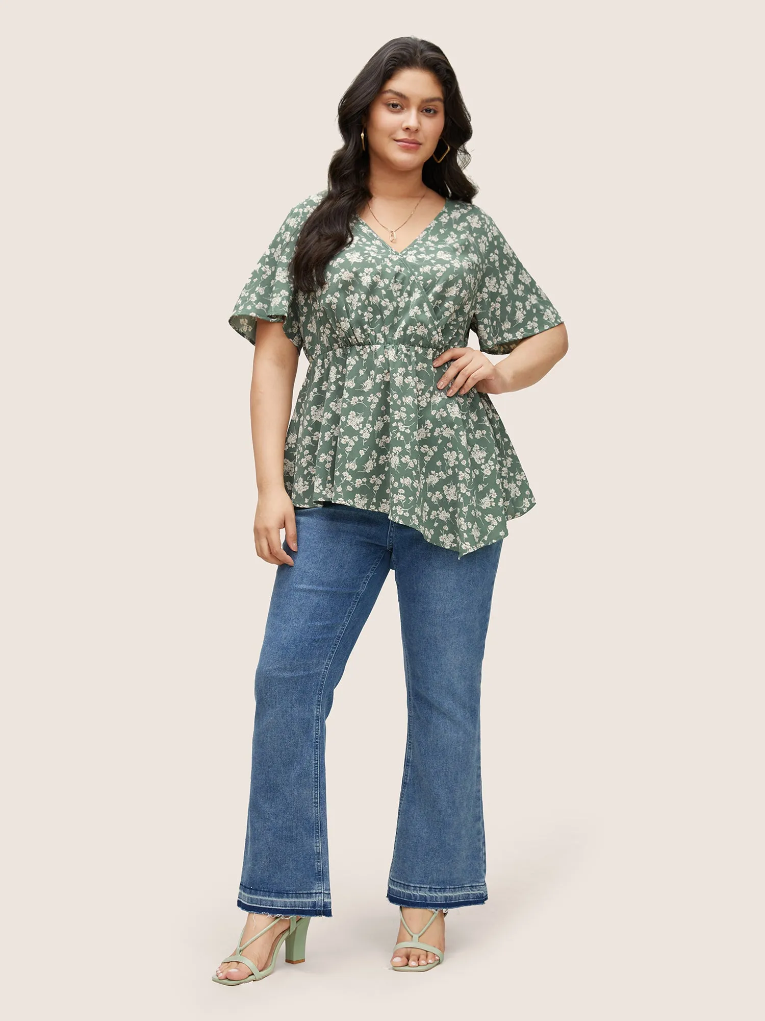 Ditsy Floral Elastic Waist Wrap Asymmetrical Hem Blouse sold by Bloomchic product image thumbnail 2